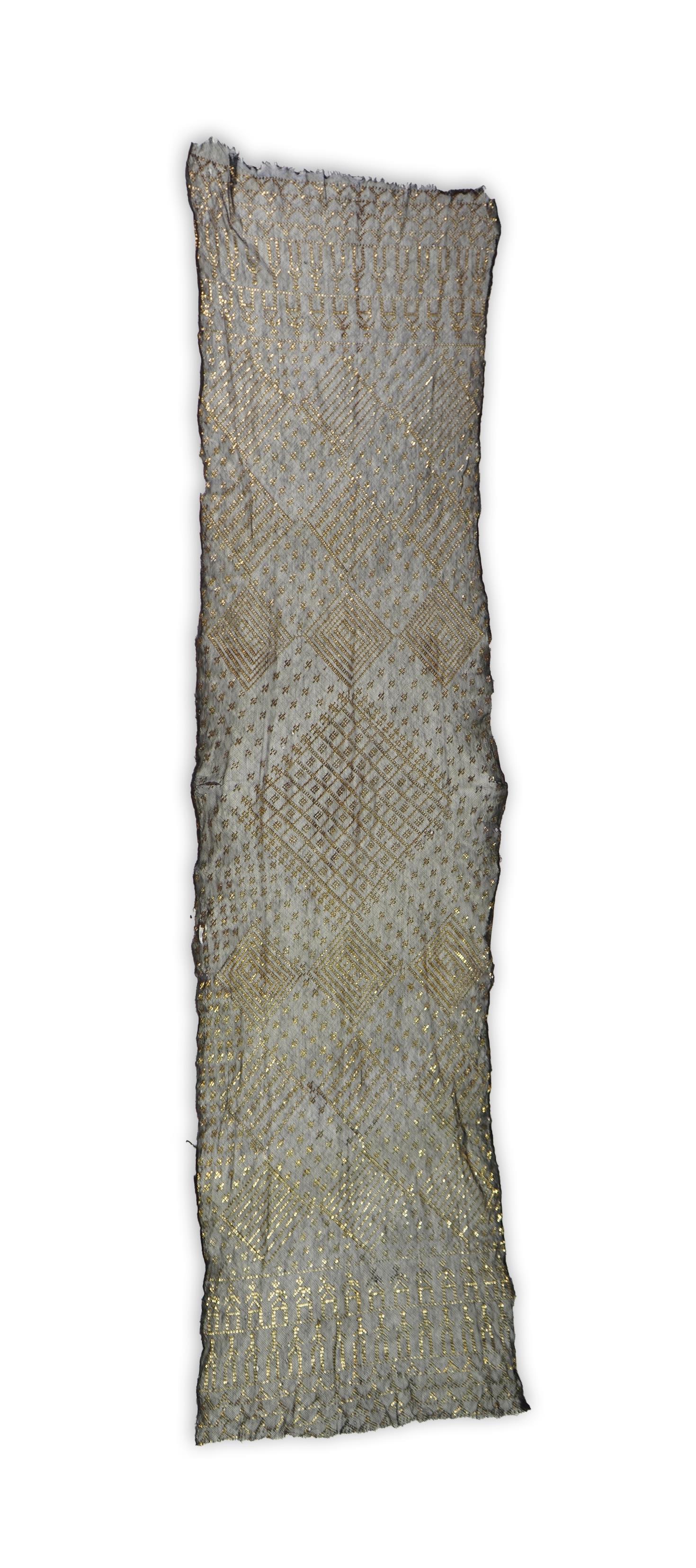 A 1930’s Egyptian decorative metal on black net evening stole. Approximately 218cm long. Condition - the rolled edges are frayed but the colour and design are intact.